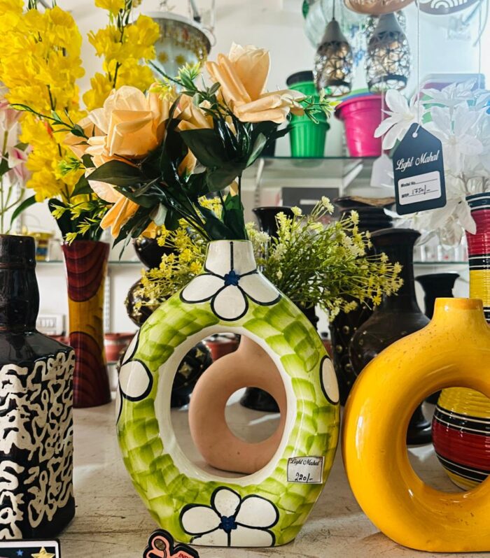 Handcrafted Ceramic Flower Vase with Unique Circular Design